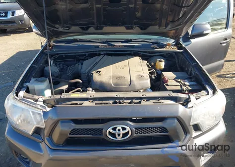 2015 Toyota Tacoma Base V6 из США, поврежденный, VIN 3TMLU4EN9FM198841